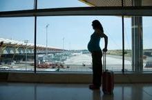 Pregnant person in airport