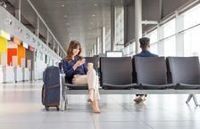 Woman waiting at airport gate