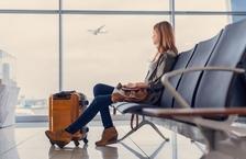 Woman waiting at airport gate