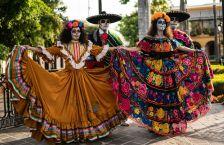 Dancers in traditional costumes for Day of the Dead in Mexico.