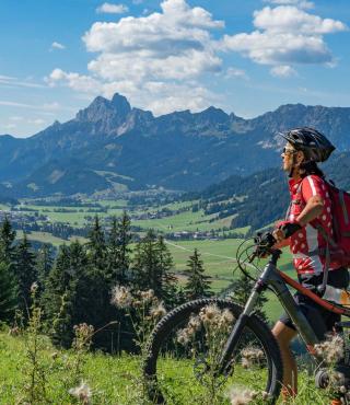 Woman with electric mountain bike