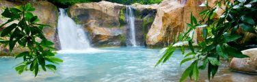 Get travel insurance to see waterfalls in Costa Rica.