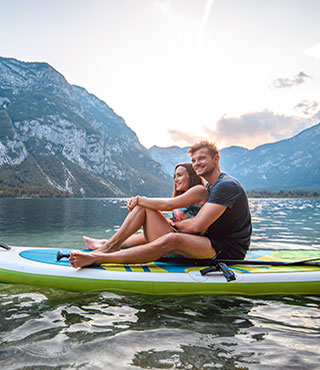Man and woman on paddleboard