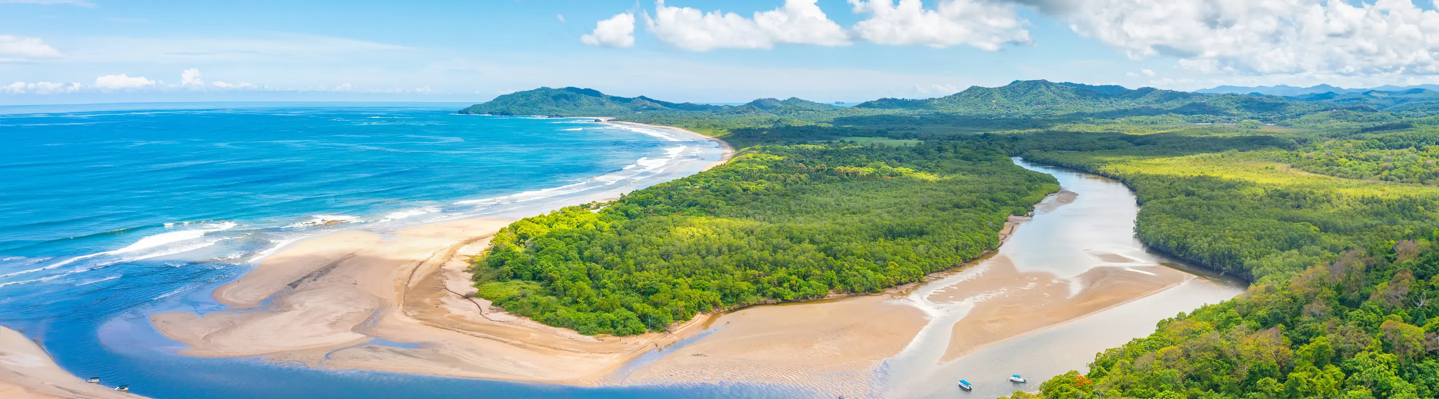 Aerial view of Tamarindo Beach highlighting travel insurance for Costa Rica