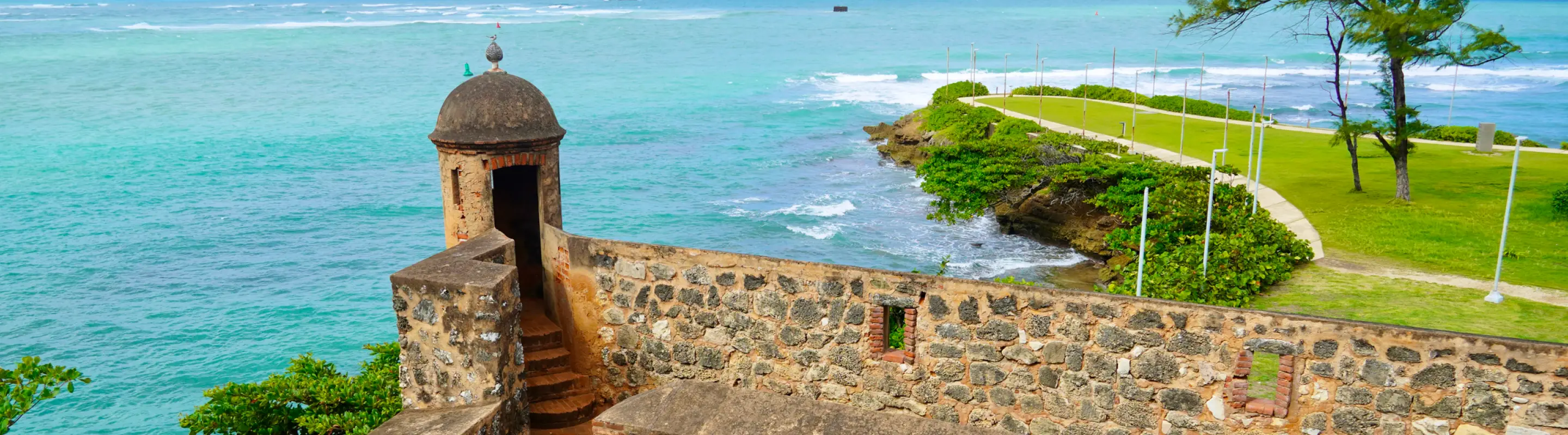 View of Fort San Filipe with the ocean in the background for travel insurance for Dominican Republic trips