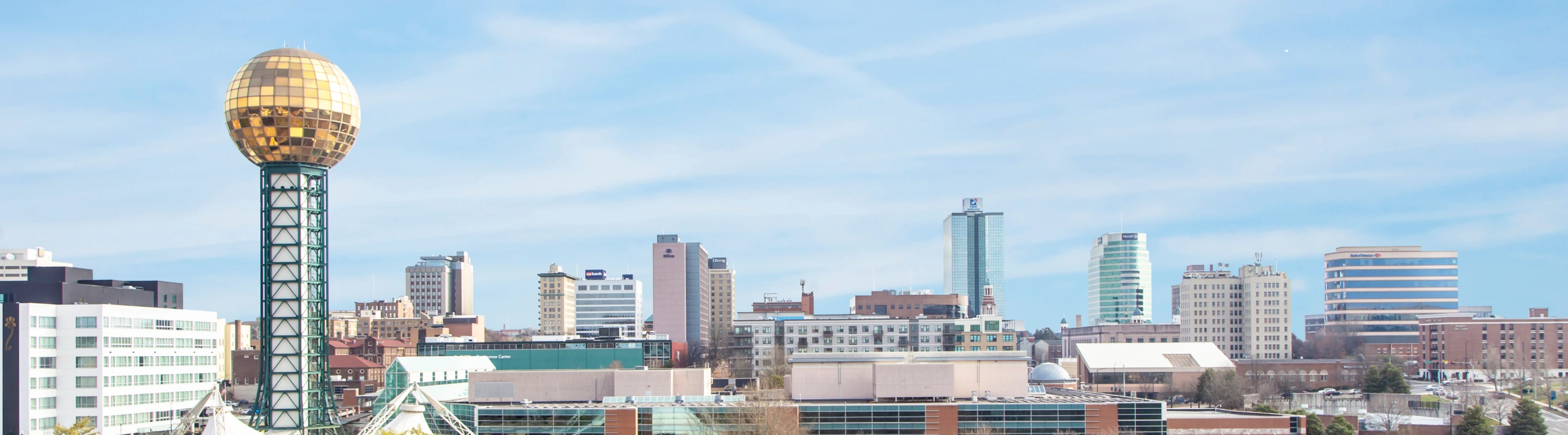 Panoramic view of the Knoxville skyline, highlighting travel insurance for Tennessee