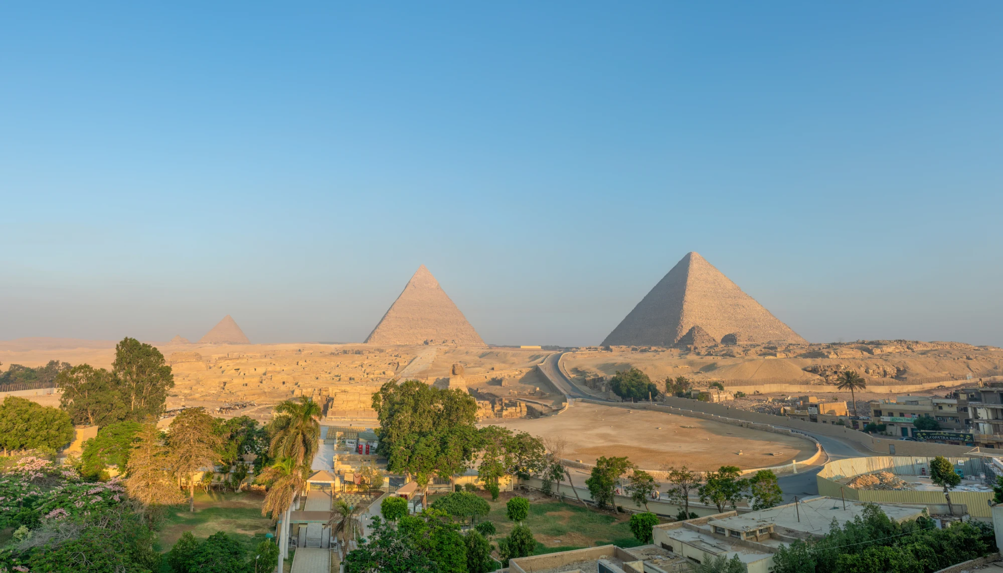 an aerial view of the Giza Plateau in Egypt, an attraction where responsible travelers often visit 
