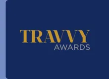 Travvy Awards logo displayed on a navy background, highlighted in the Travelex Insurance newsroom