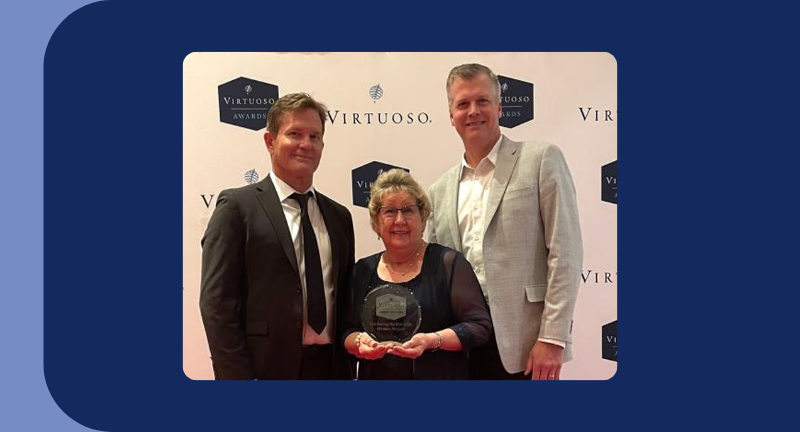 Three travel industry professionals pose with a Virtuoso award, highlighted in the Travelex insurance newsroom
