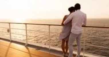 Man and woman on deck of cruise ship