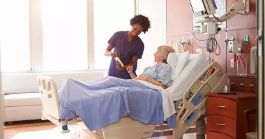 Doctor with patient that needed to go to a hospital on vacation.
